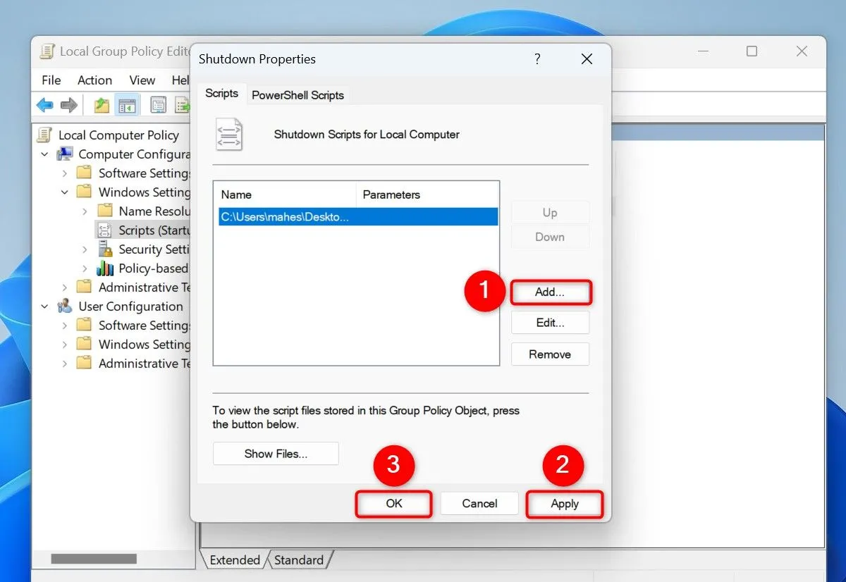 Cửa sổ Group Policy Editor hiển thị cài đặt Shutdown Properties, cho phép thêm script khi tắt máy.