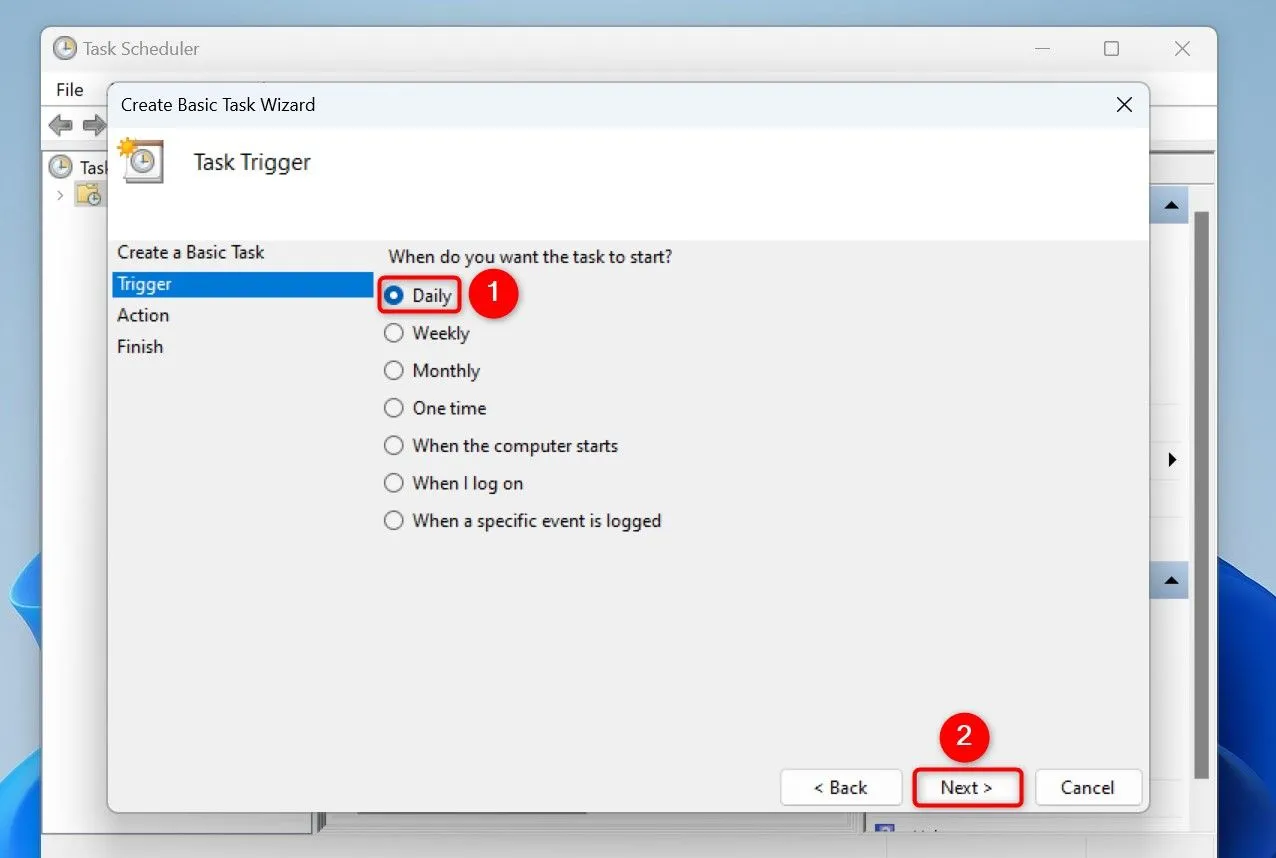 Cửa sổ Task Scheduler hiển thị bước chọn tần suất chạy nhiệm vụ, với tùy chọn &quot;Daily&quot; được chọn.