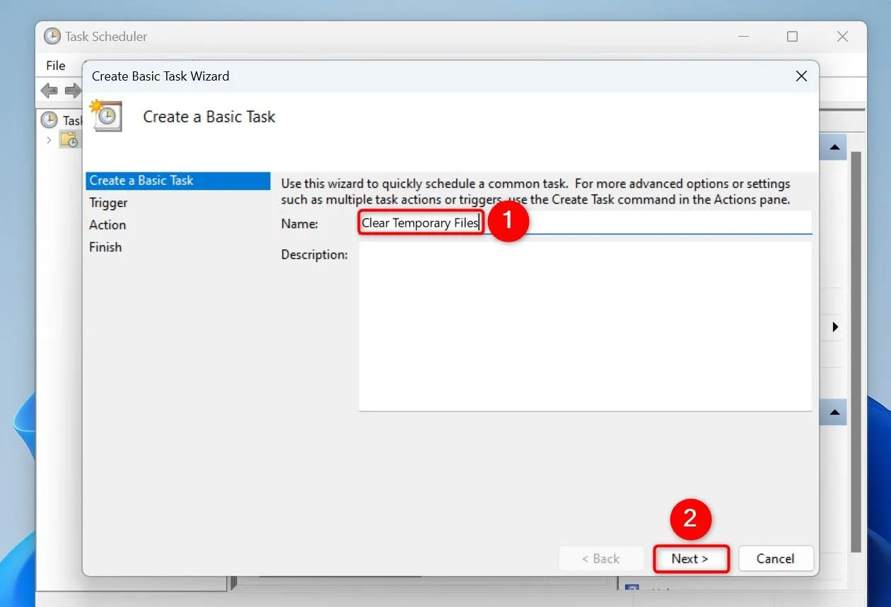 Cửa sổ Task Scheduler hiển thị bước đặt tên nhiệm vụ, với tên &quot;Clear Temporary Files&quot; được nhập.