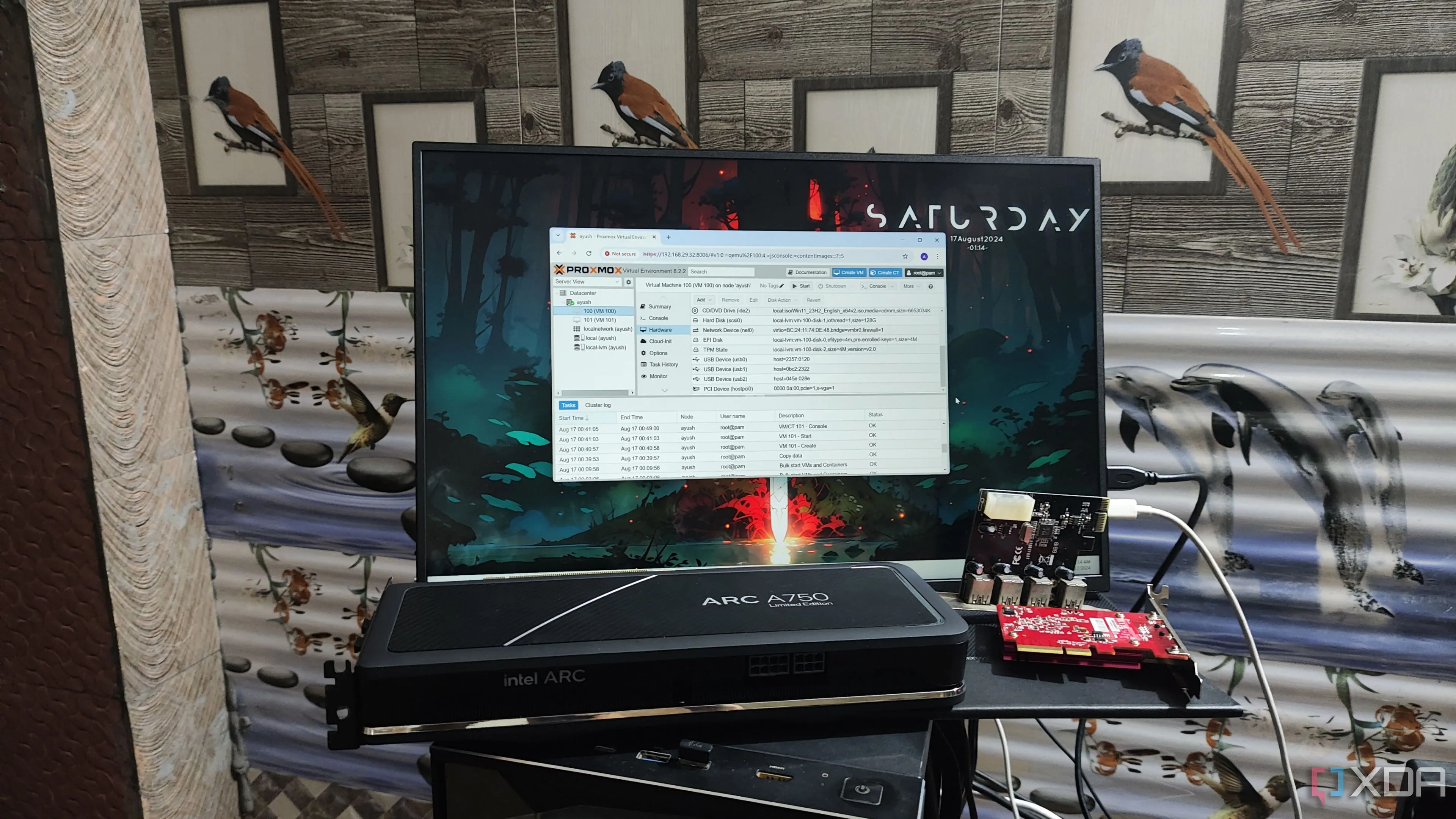 GPU Intel Arc A750, card WLAN, và card mở rộng USB trước màn hình hiển thị giao diện Proxmox