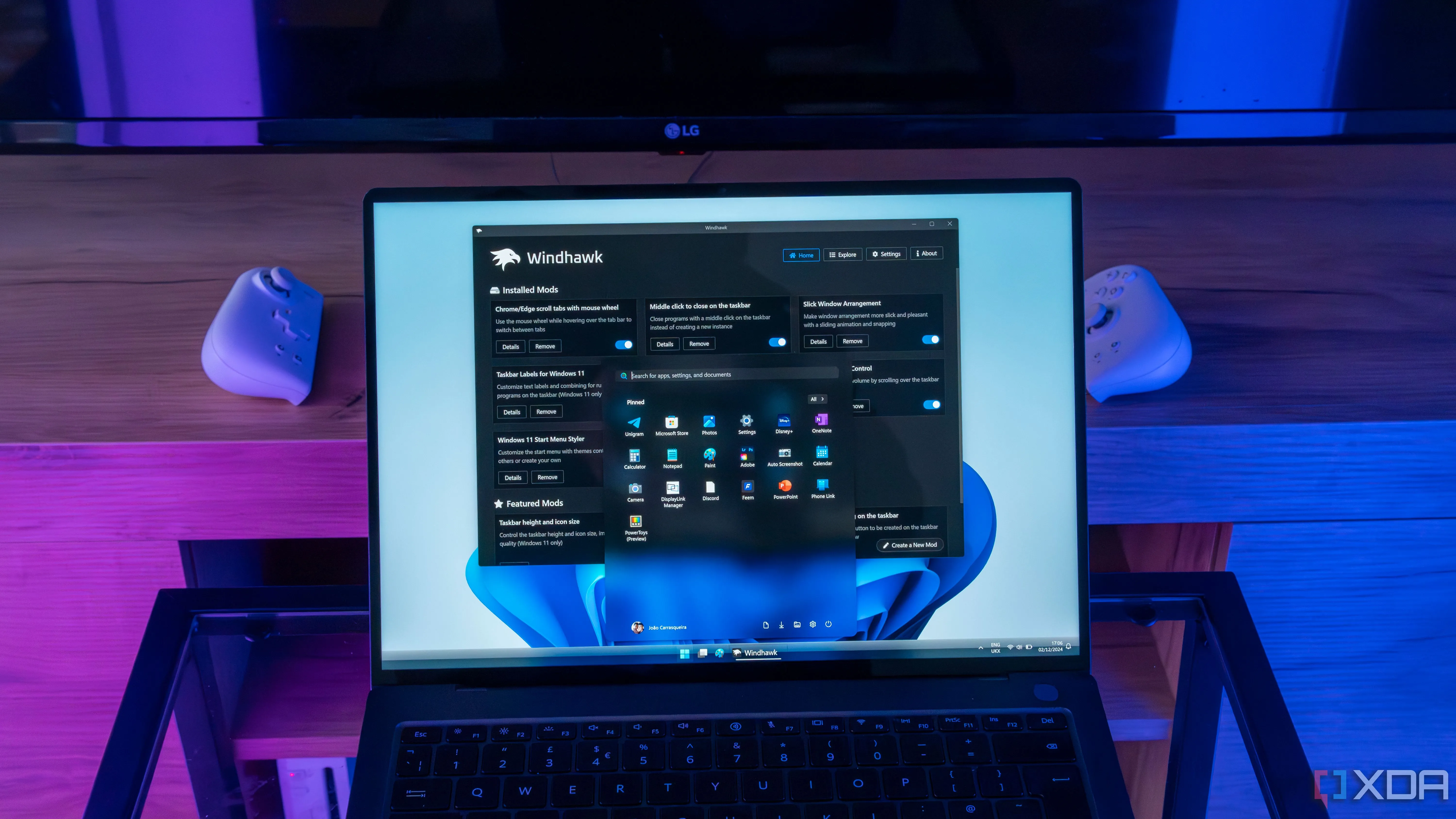 Laptop Windows 11 tùy chỉnh Start menu và thanh tác vụ với Windhawk, minh họa tiềm năng của các chủ đề độc đáo