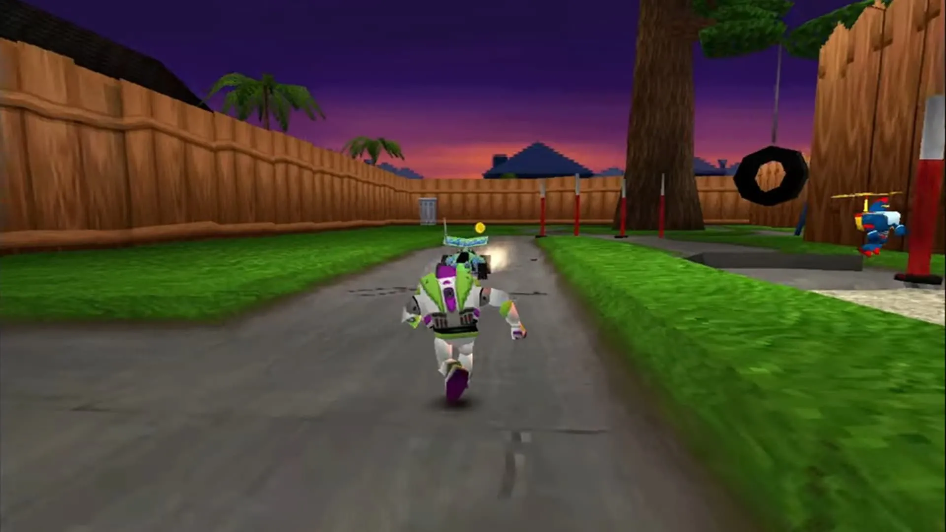 Buzz Lightyear chạy đua với xe RC trong màn chơi Khu Phố của Toy Story 2: Buzz Lightyear to the Rescue