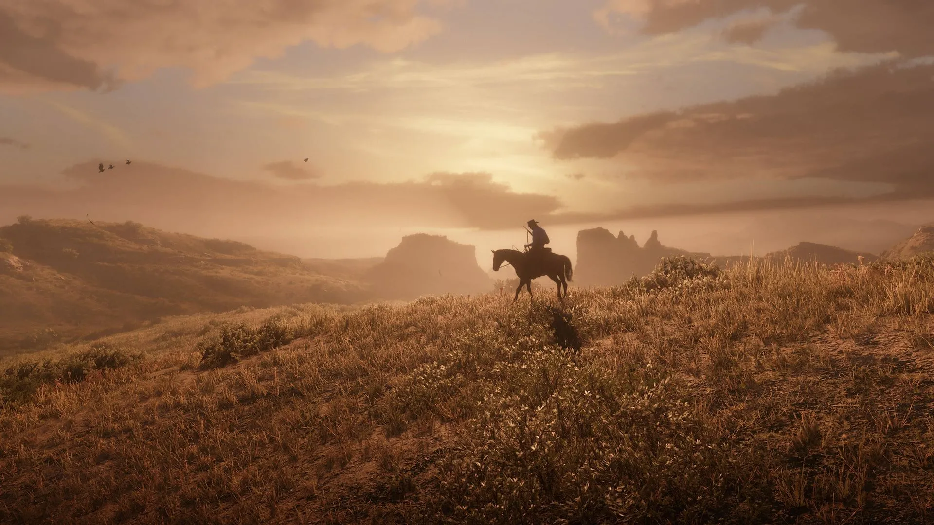 Cảnh hoàng hôn tuyệt đẹp trong game Red Dead Redemption 2, minh họa game AAA đẳng cấp trên Steam