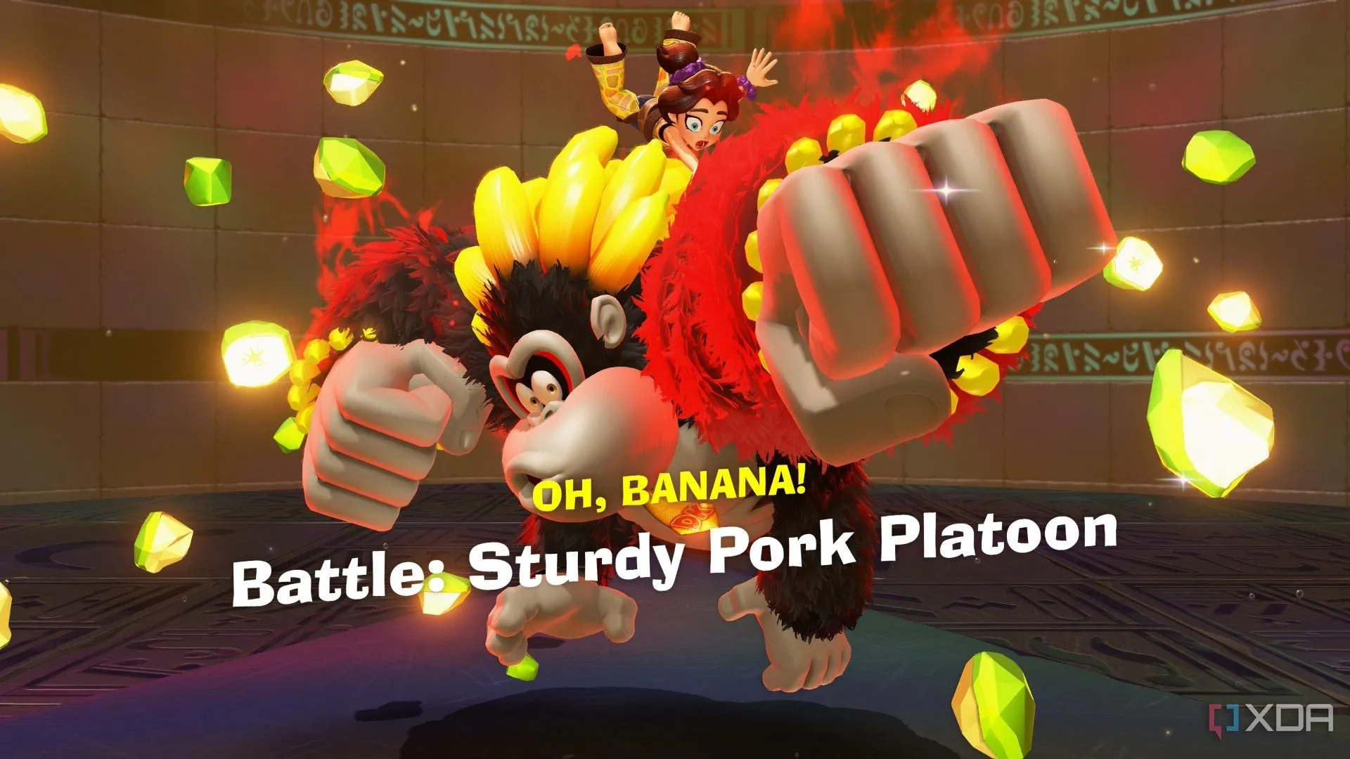 Donkey Kong trong hình dạng Bananza mạnh mẽ đang tìm thấy viên Banandium Gem quý giá, thể hiện cơ chế khám phá và sưu tầm trong Donkey Kong Bananza