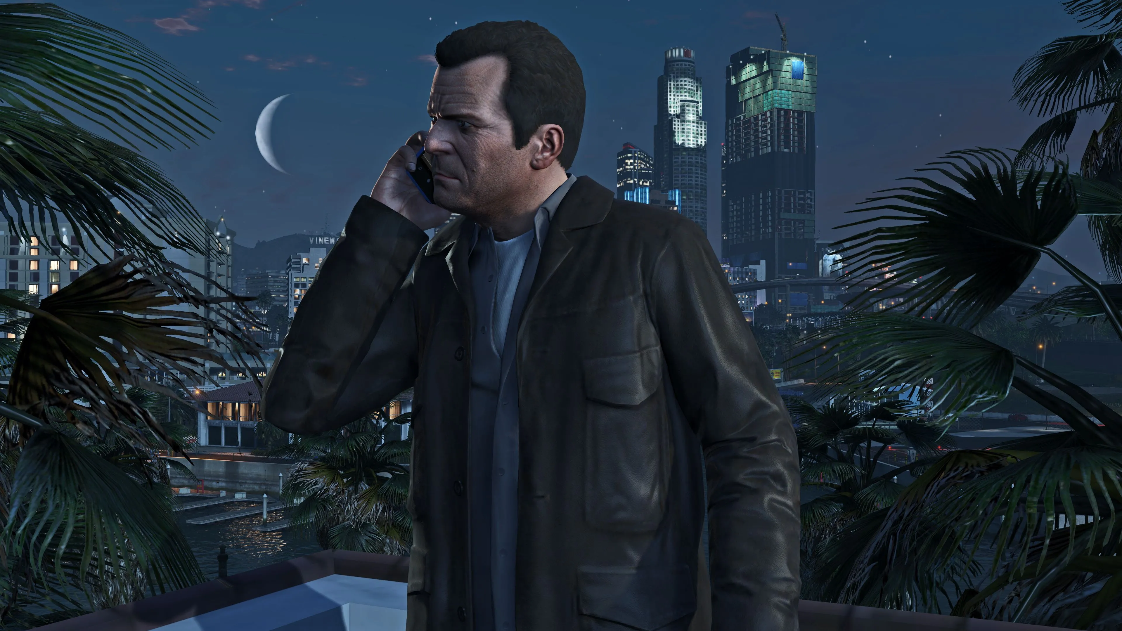 Một người đàn ông đang nói chuyện điện thoại trong Grand Theft Auto V, tượng trưng cho các vai trò kinh doanh và quản lý nơi AI tạo sinh được ứng dụng nhiều hơn trong ngành game.