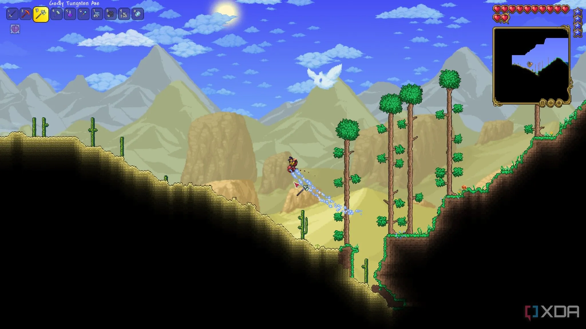 Người chơi trong môi trường sa mạc biome của game Terraria với đồ họa pixel cổ điển