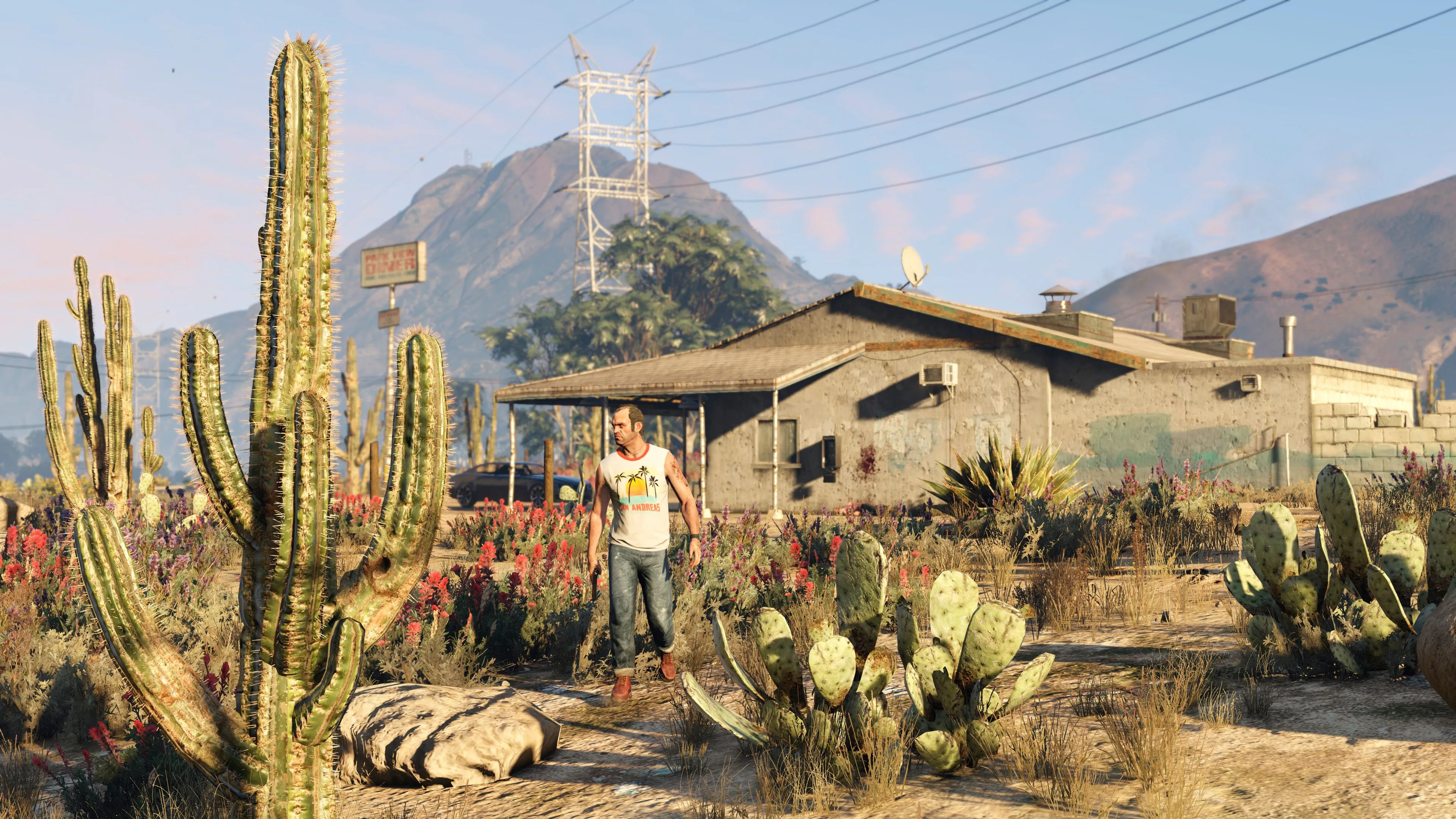 Nhân vật Trevor đi bộ trước một căn nhà ở Blaine County trong GTA V, tượng trưng cho trải nghiệm cốt truyện sâu sắc của game
