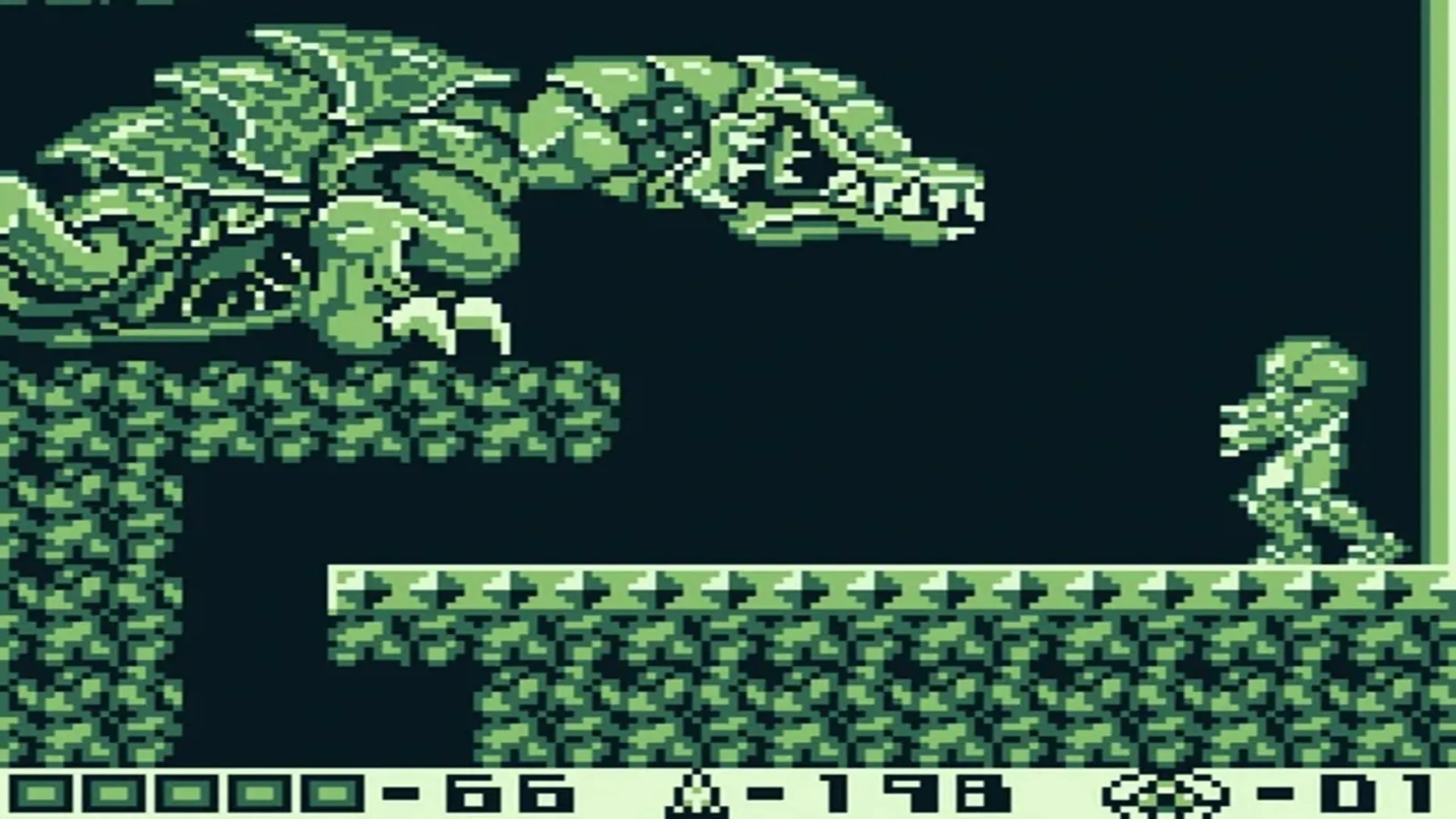 Samus Aran trong game Metroid II Return of Samus trên Game Boy, với đồ họa đơn sắc đặc trưng và môi trường hành tinh SR388.