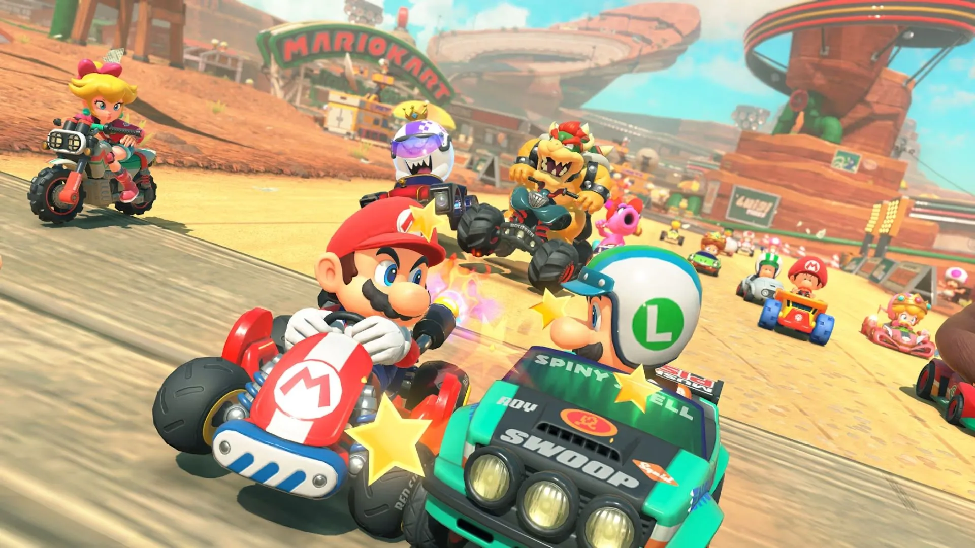Tay đua Mario cùng Donkey Kong và Peach trên đường đua Mario Kart World