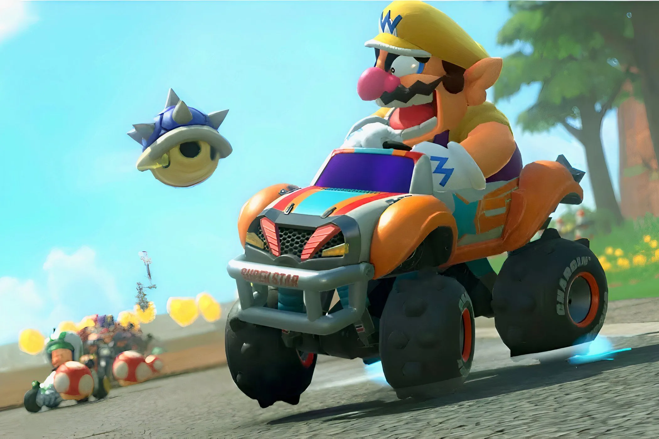 Wario đang tức giận nhìn một chiếc Blue Shell bay về phía mình trong Mario Kart World, minh họa vật phẩm mai rùa xanh đáng sợ tự động tìm kiếm người dẫn đầu để tấn công.
